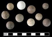 Various stone marbles from a cellar filled in the late 19th- to early 20th-centuries - click on image to see larger view.